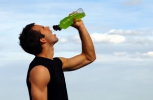 drinking sports drink 300x197 What Your Clients Don’t Know About Nutrition Is Injuring Them (and You)