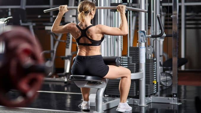 young woman lat pull down