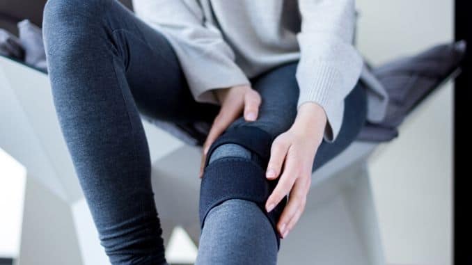 Sick female with orthopedic bandage