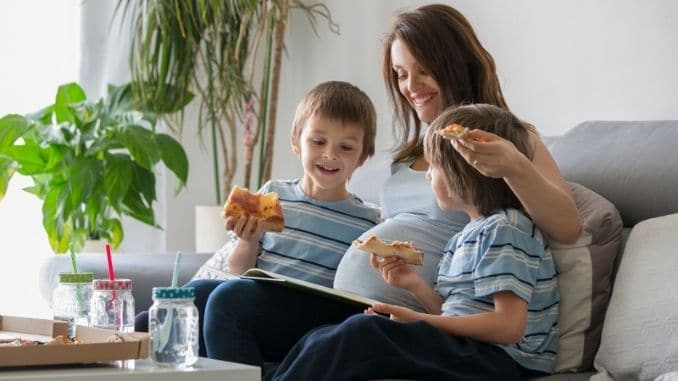 Happy young family foods to avoid while pregnant