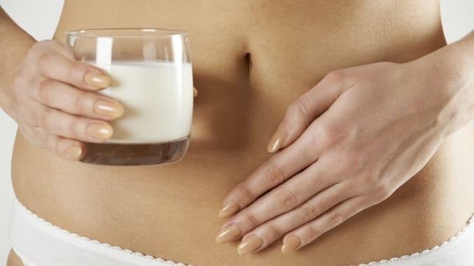woman-holding-glass-milk