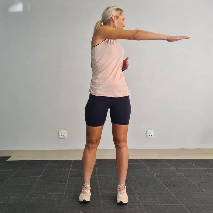 cross body reach - start - Fabric Resistance Bands