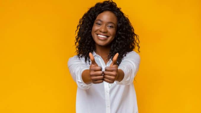 black-woman-showing-thumbs - De quervain's Tenosynovitis Massage