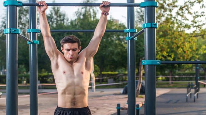 male-athlete-doing-chin-up